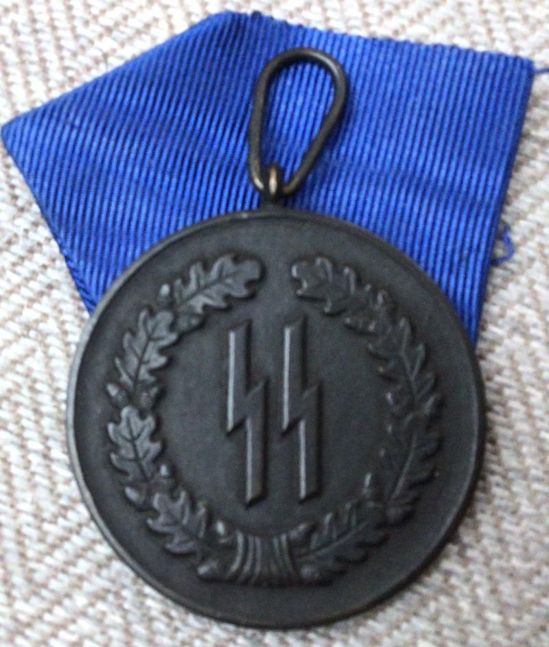 SS 4 YEAR SERVICE MEDAL.