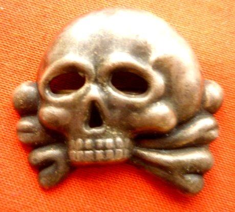 EARLY SS METAL SKULL.