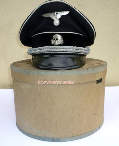 SS OFFICER SILK TOPPED VISOR, NAMED AND IN ITS ORIGINAL MAKERS BOX.