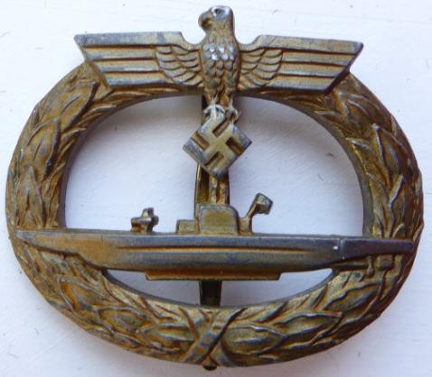 EARLY BRASS U-BOAT BADGE.