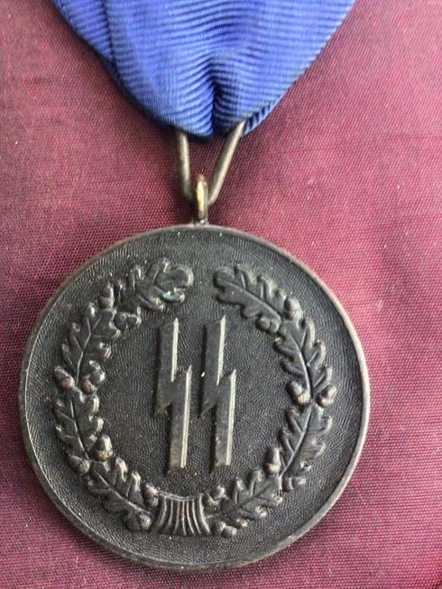 SS 4 YEAR SERVICE MEDAL.