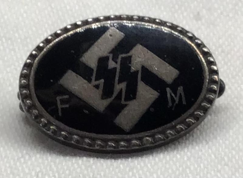 SS FM LAPEL PIN, FULLY NUMBERED.