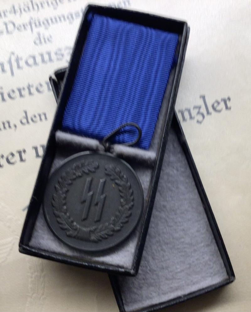 SS 4 YEAR BOXED MEDAL WITH LSSAH CITATION.