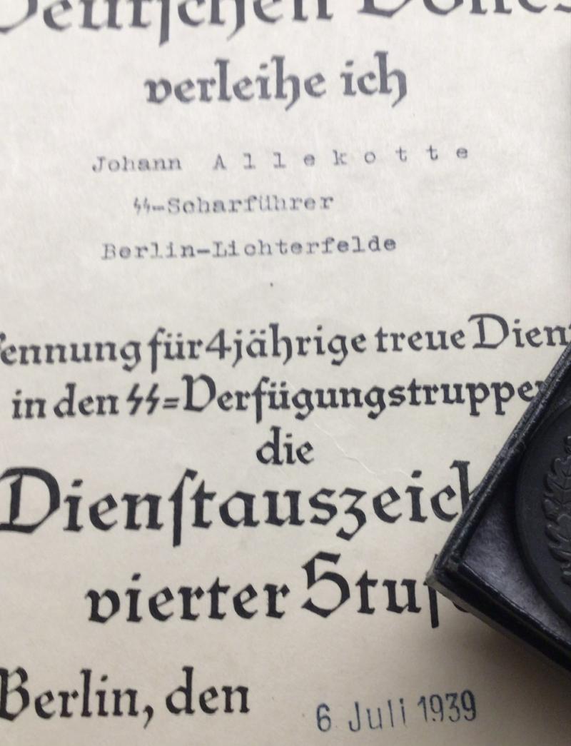 SS 4 YEAR BOXED MEDAL WITH LSSAH CITATION.