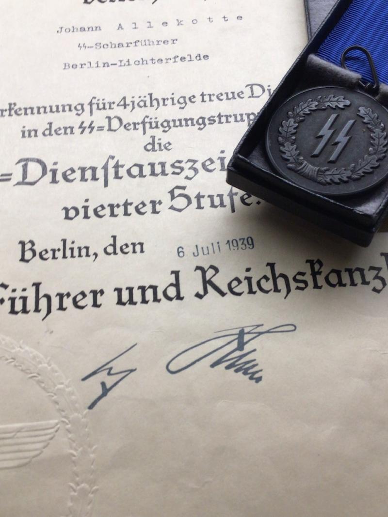 SS 4 YEAR BOXED MEDAL WITH LSSAH CITATION.