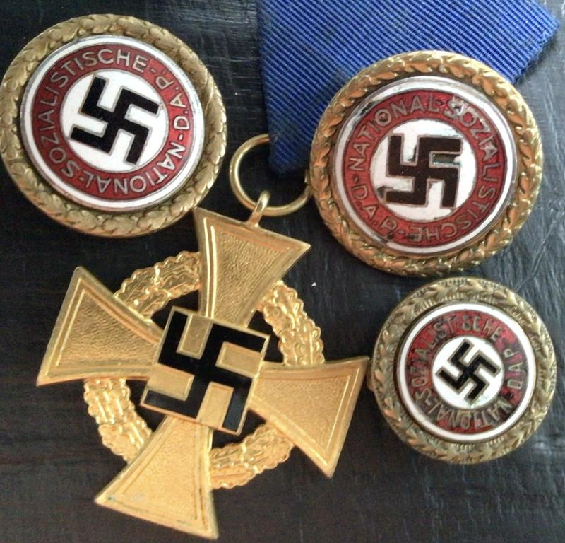 THREE GBP´S AND A GOLD LONG SERVICE MEDAL.